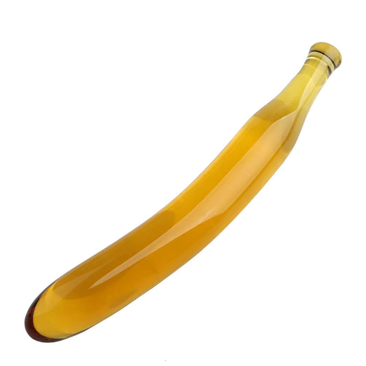 Simba the Silly Banana glass dildo in Transparent Yellow, showcasing its anatomical curve and smooth, non-porous borosilicate finish