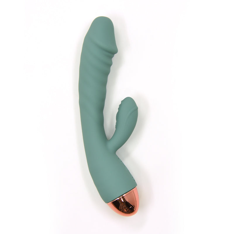 Norma dual-motor dildo in Silver Sage, highlighting the ergonomic curve and internal warming heating element."